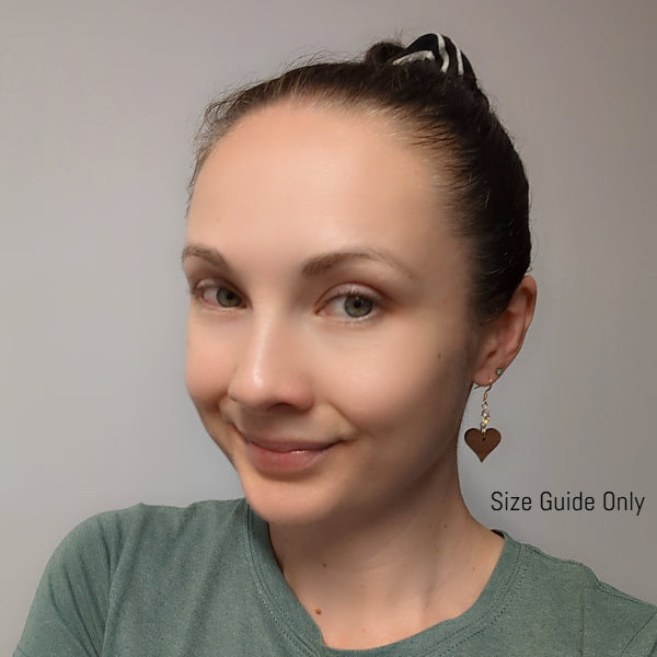 Women wearing Amore Dangles as a size guide.