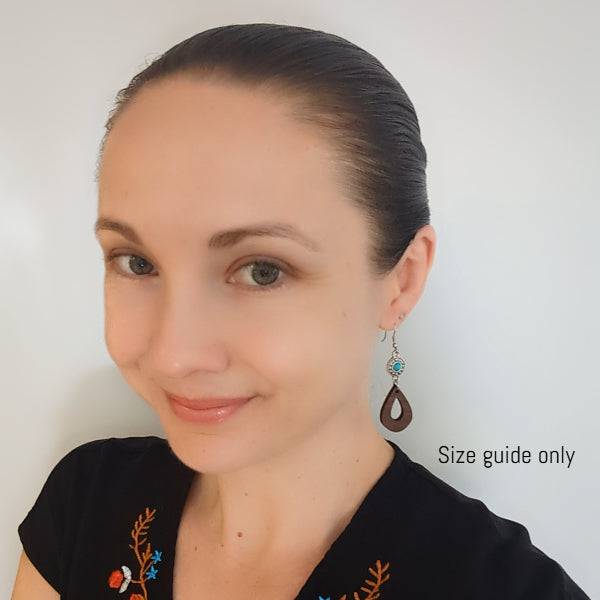 Women wearing Calista Dangles as a size guide.
