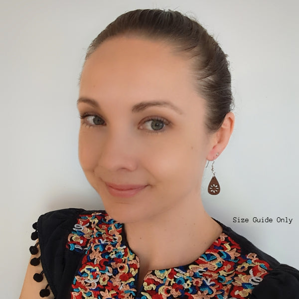 Women wearing Cleo drops as a size guide.