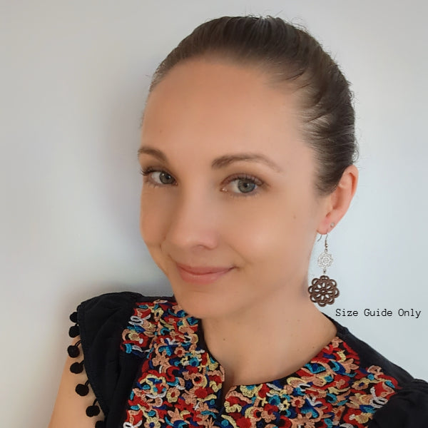 Women wearing Dahlia Dangles as a size guide.