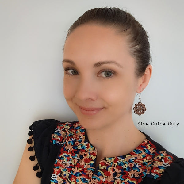 Women wearing Dahlia Drops as a size guide.