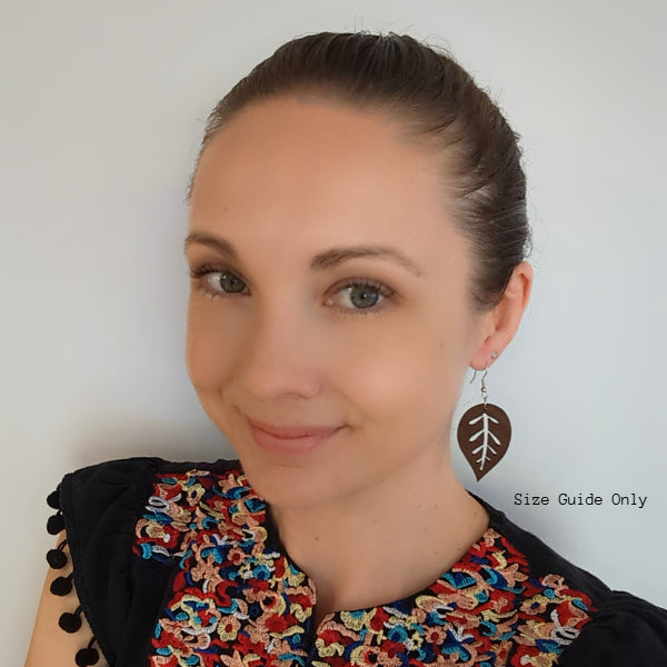 Women wearing Fern Drops as a size guide.