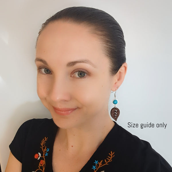Women wearing Maya Dangles as a size guide.