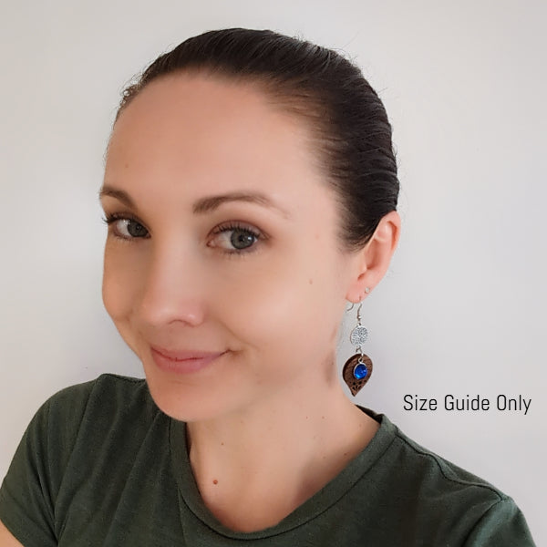 Women wearing Oriana Dangles as a size guide.