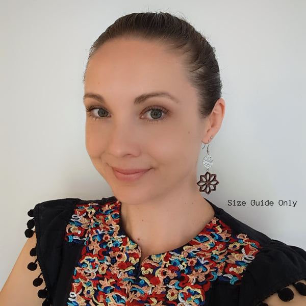 Women wearing Zinnia Dangles as a size guide.