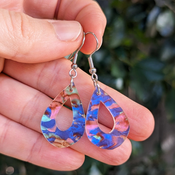 Colourful acrylic teardrop earrings with stainless steel hooks.