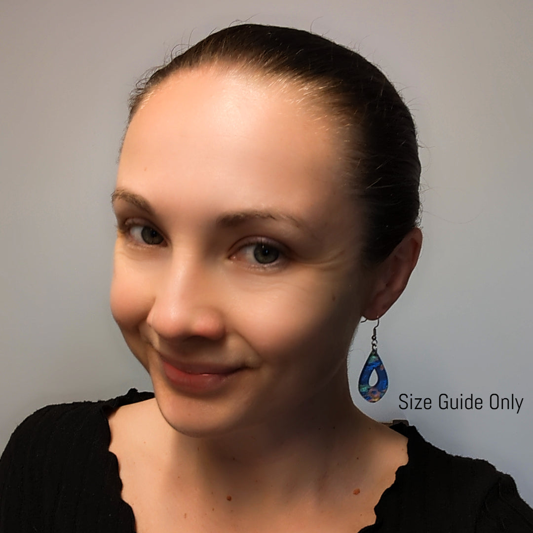 Woman wearing Blair Drops as a size guide.
