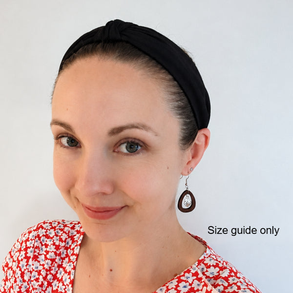 Woman wearing Eva Drops as a size guide.