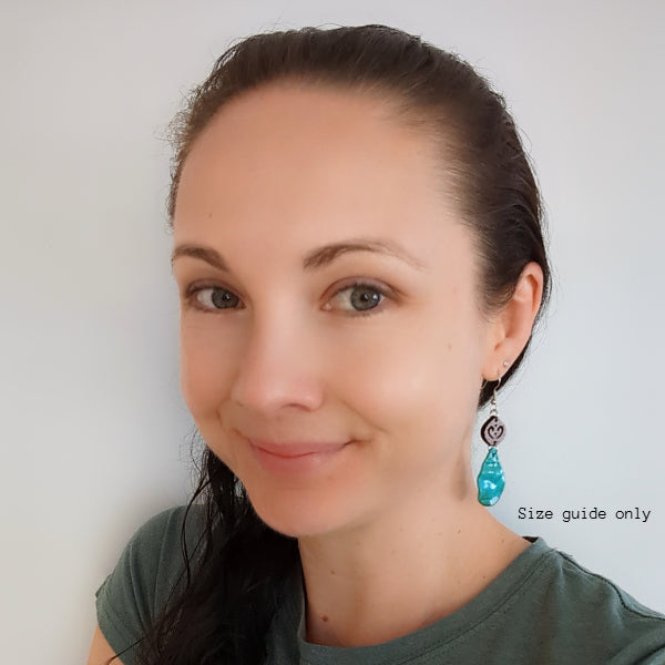 Women wearing Gaia Dangles as a size guide.