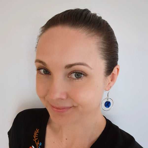 Woman wearing Gwen Dangles as a size guide.