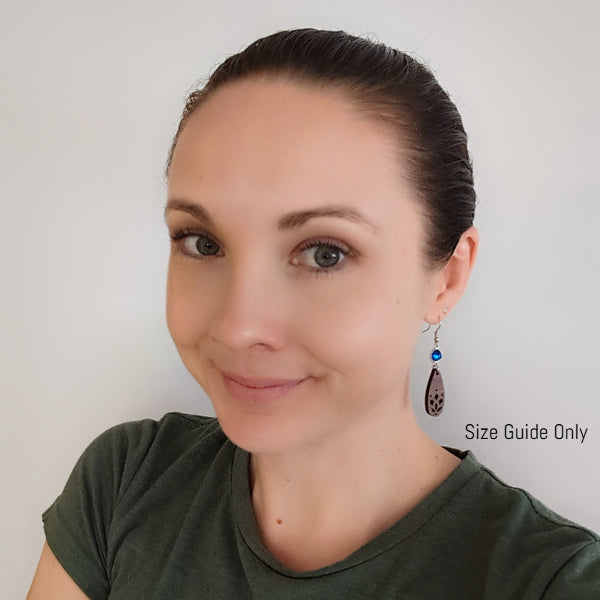 Women wearing Isla Dangles as a size guide.