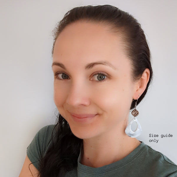 Women wearing Lily Dangles as a size guide.