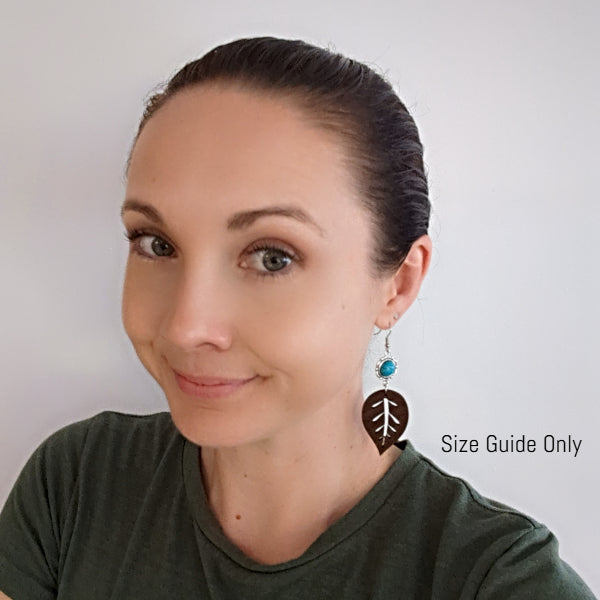 Women wearing Livia Dangles as a size guide.