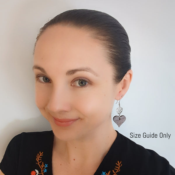 Women wearing Mila Dangles as a size guide.