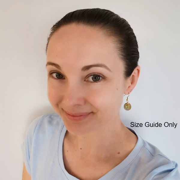 Woman wearing Opal Drops as a size guide.