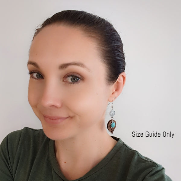 Women wearing Oriana Dangles as a size guide.