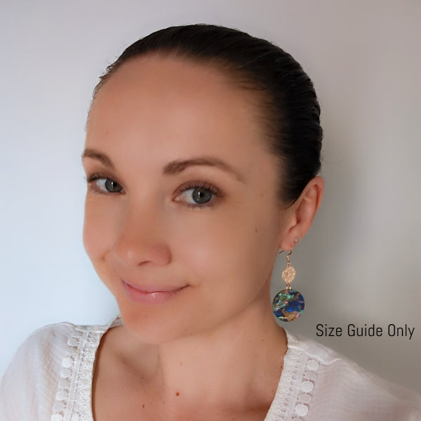 Women wearing Orla Dangles as a size guide.