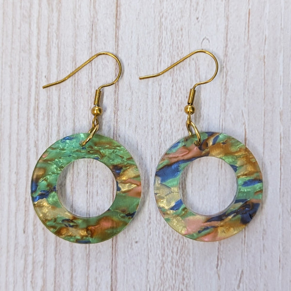 Colourful acrylic resin circular earrings.