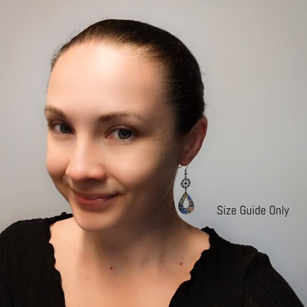 Woman wearing Primrose Dangles as a size guide.