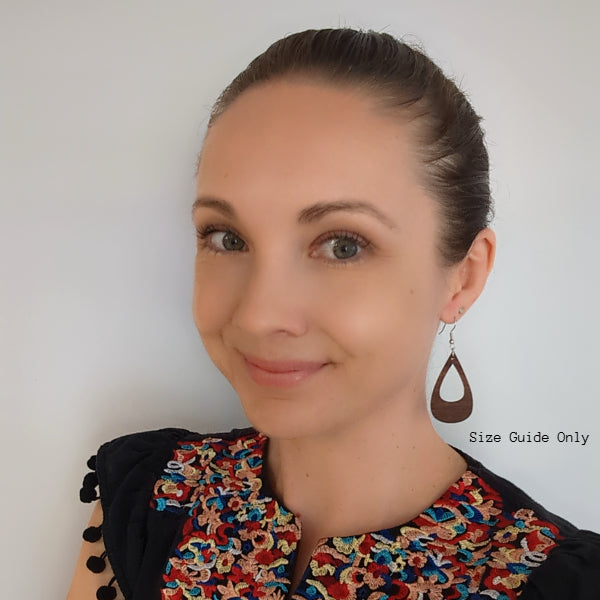 Women wearing Selene Drops as a size guide.