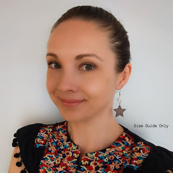 Women wearing Sirius Dangles as a size guide.