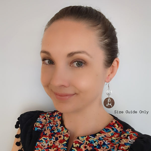 Women wearing Vixen Dangles as a size guide.