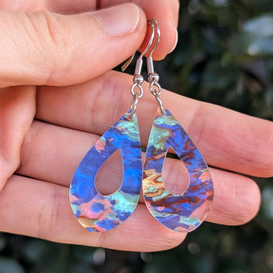 Colourful acrylic teardrop earrings with stainless steel hooks.
