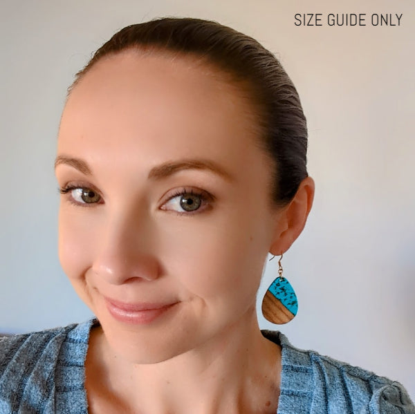 Women wearing Eva drops as a size guide.