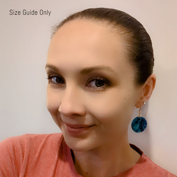 Women wearing Celestial Drops as a size guide.