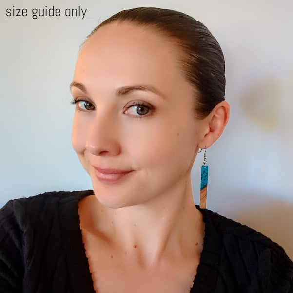 Women wearing Nebula drops as a size guide.