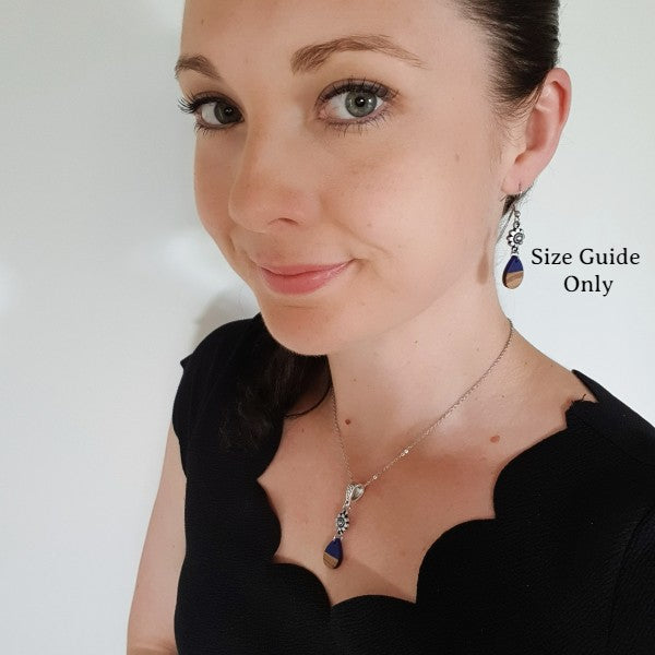 Women wearing Mini Resin Drops as a size guide.