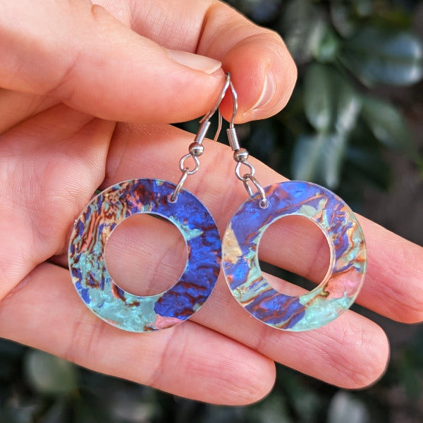 Colourful acrylic disc earrings.