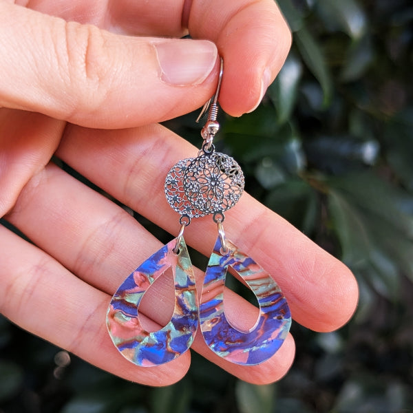 Colourful acrylic tear drop earrings with floral silver toned connectors.