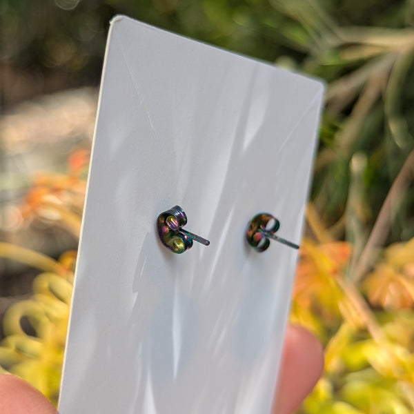 stud backs on white card