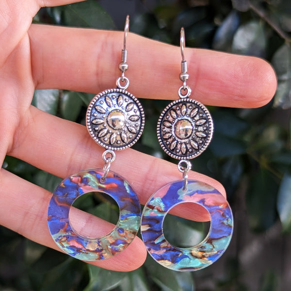 Colourful round acrylic earrings with sliver toned connectors.