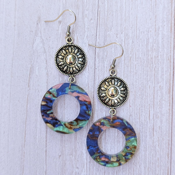 Colourful round acrylic earrings with sliver toned connectors.